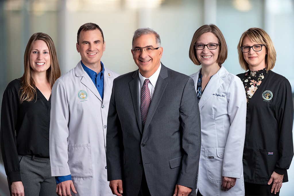 Kelly (Medical Assistant), Scott McKay (Physician Assistant), Dr. Craig Torosian, Evangeline Taylor (Physician Assistant), and Jenni (Medical Secretary). Kathy (Medical Assistant) not pictured.