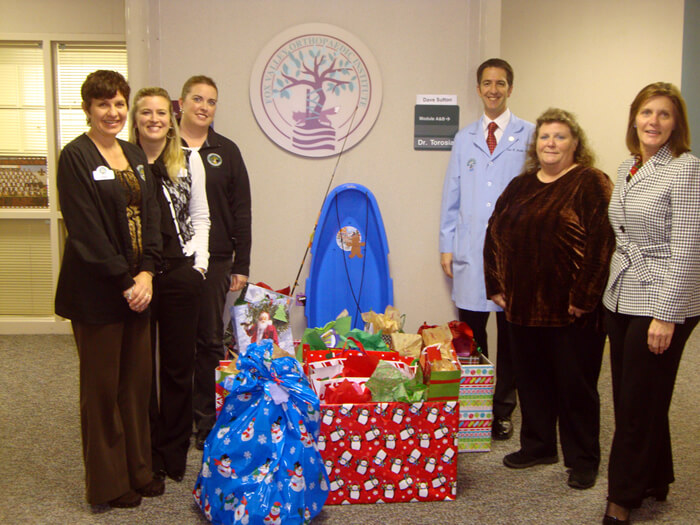 Left to right, Debbie Navigato, Melanie McFall, Melissa Dziubinski, Eric Bartel, MD with FVO, Karen May with Breaking Free, and Dawn Coghlan, Director of Clinical Services at FVO.