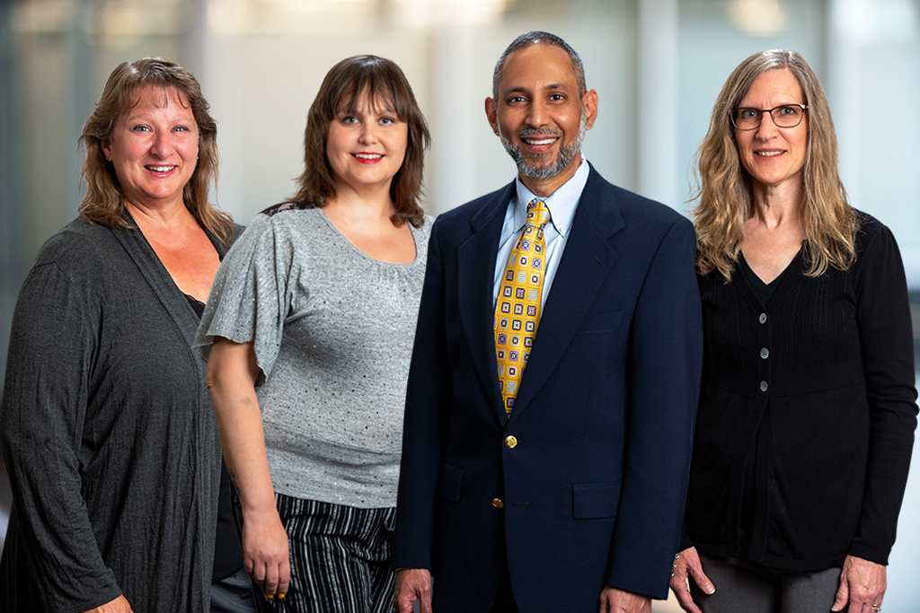 From left: Jodie (Medical Assistant), Kristy (Care Team Coordinator), Dr. Raheem Nazeer, Kris (Registered Nurse), and Maggy (Registered Nurse)